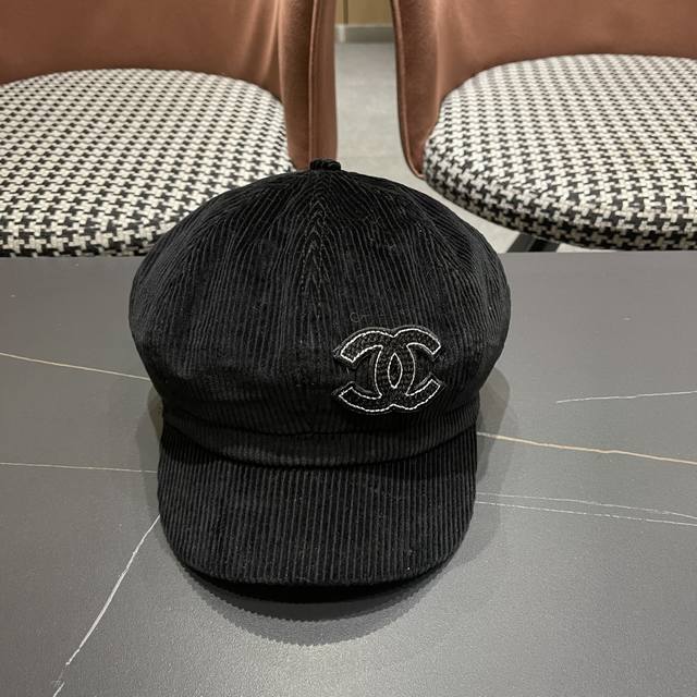 Chanel* The octagonal beret is very textured. The shape of the hat is really sup