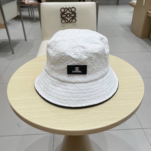 Chanel's new denim blue retro bucket hat is a great vintage hat for holidays. Th