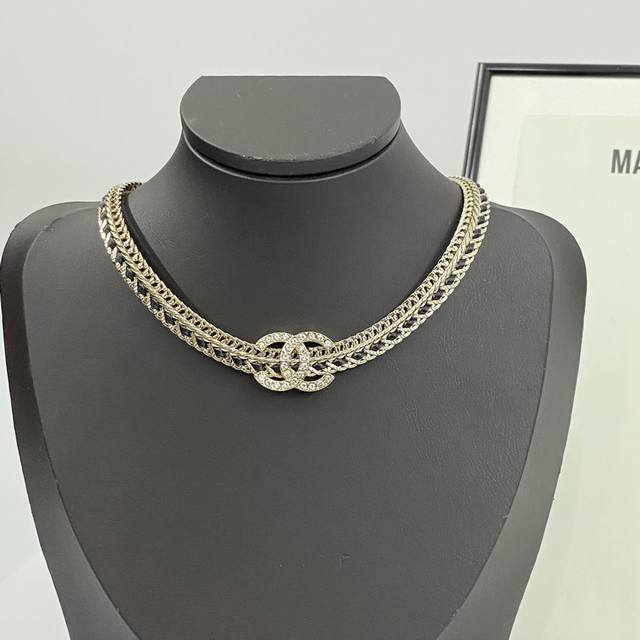 Chanet's necklace is a hot seller and is now available. Diamond-patterned leathe