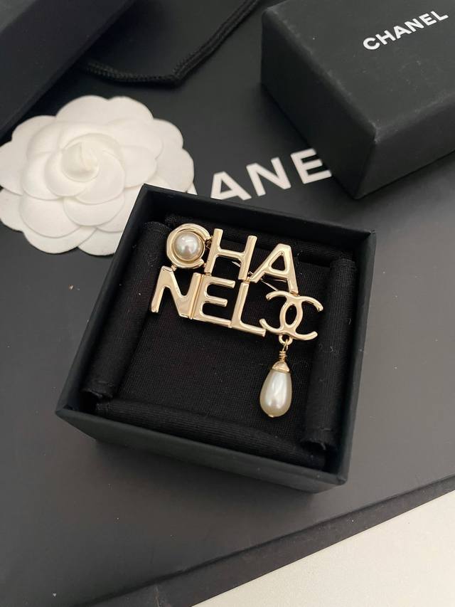 Cnel's most classic, versatile and distinctive shield brooch, Brooch, has a stro