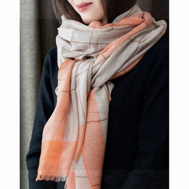 The latest Burberry Lightweight Check Scarf has arrived, featuring an exquisite