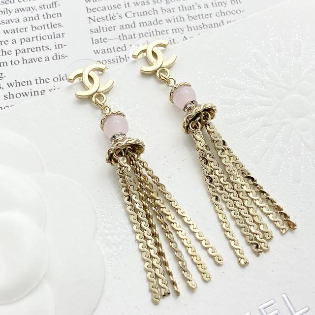Chanel earrings are hot sellers! New arrival: Chan 25 Double C Pink Pearl Tasse
