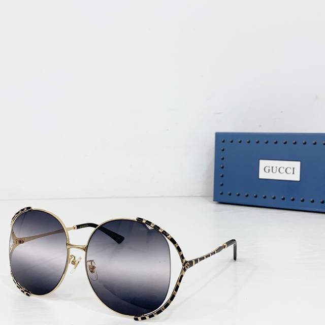 Gucc*Model: Gg0595S Size: 62 ports 17-135 DDD