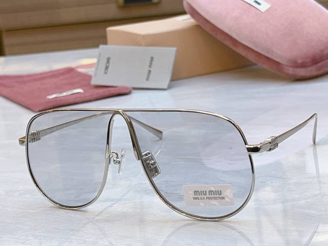 Miumi* Miu Miu new sunglasses, Mod: Smu A56, Size: 66-02-140 DDD
