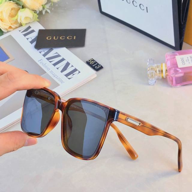 Gucc* new style sunglasses with curved lenses, fashionable and high-value sungla
