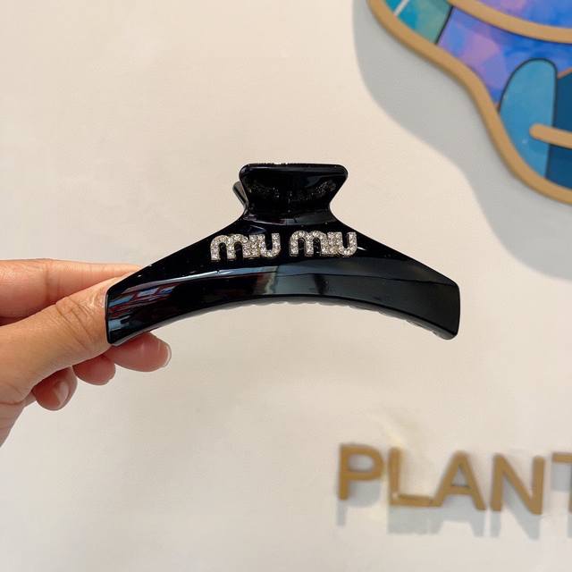 With packagingMiumiu Miu Miu's new handmade diamond-studded hair clip, high-end
