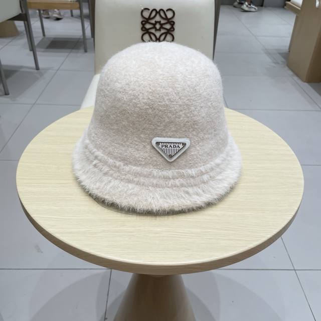 Prada Prada women's autumn and winter Korean knitted fisherman hat plain face co
