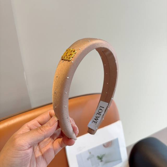 With packagingLoewe's hot new sponge headband, specially made with fabric, the l