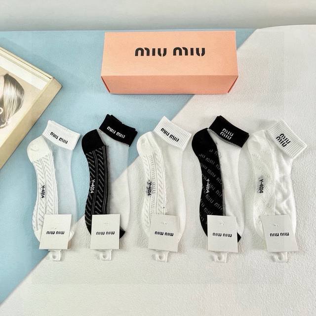Comes with a box of five pairs of Miumiu's new short ice silk socks. Ice silk a