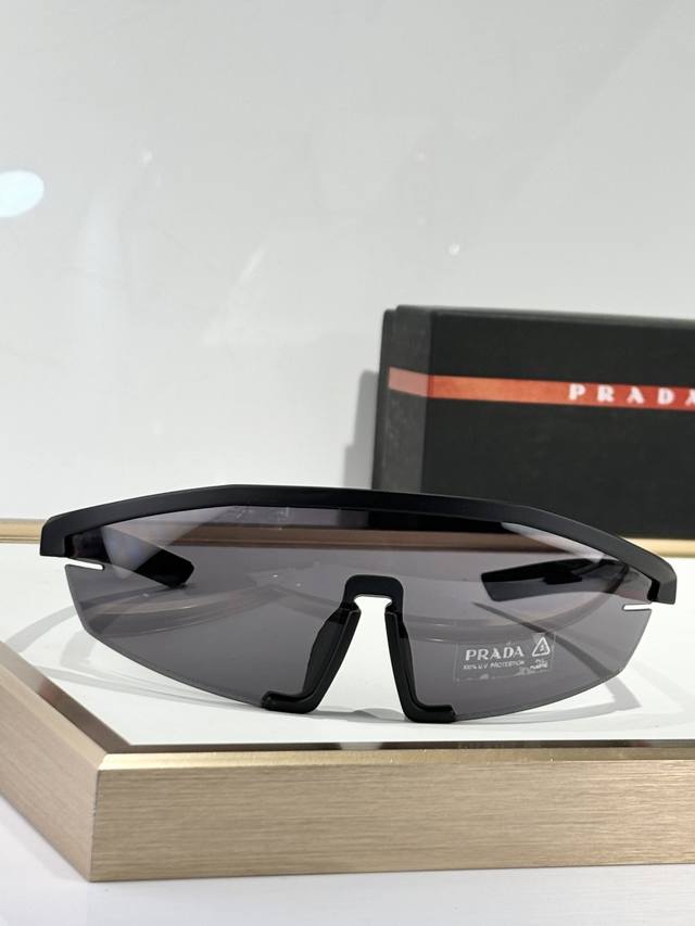Prad* Model: Sps03Z Sunglasses with an ultra-modern, wraparound design. The fron