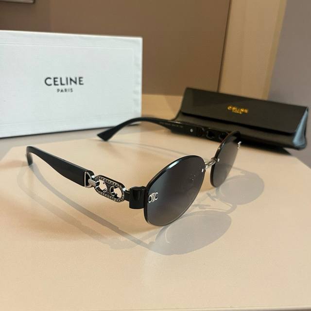Celine's new Arc de Triomphe sunglasses are paired with thick metal temples for