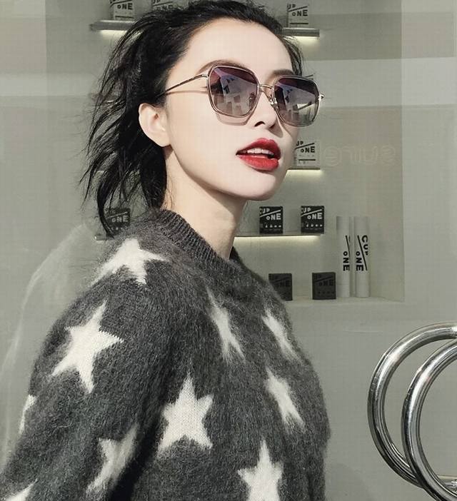Nylon polarized series Gucci sunglasses with dark round frame design, suitable