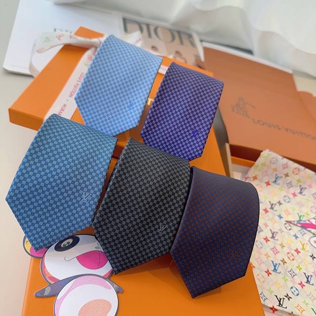 Lv tie new arrival! Louis Vuitton's classic tie features a checkered L'Or