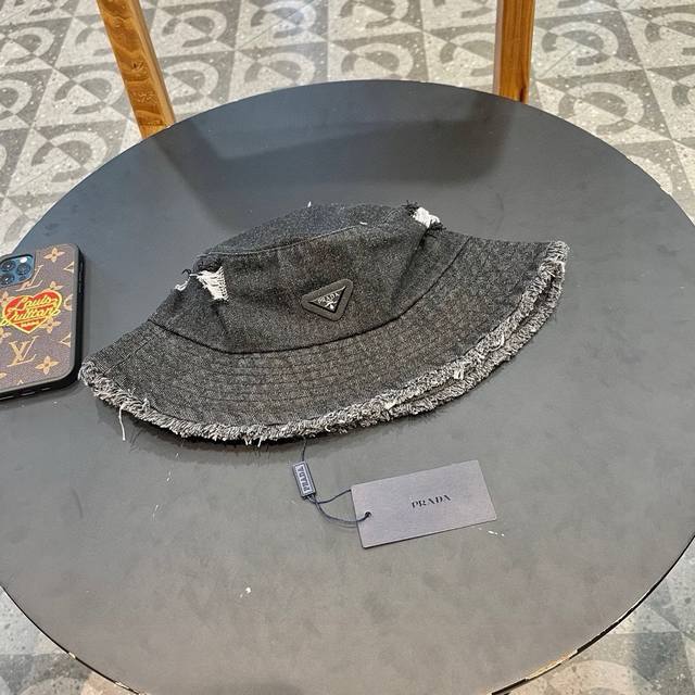 Prada Prada distressed washed denim fisherman hat women's ripped raw edge design