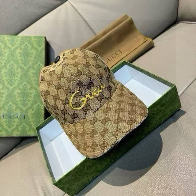 comes with a box bag. This new Gucci baseball cap features embroidered art. Mad