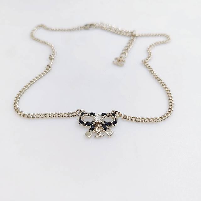 Ch*Nel latest light gold black leather bow necklace consistent Zp brass material
