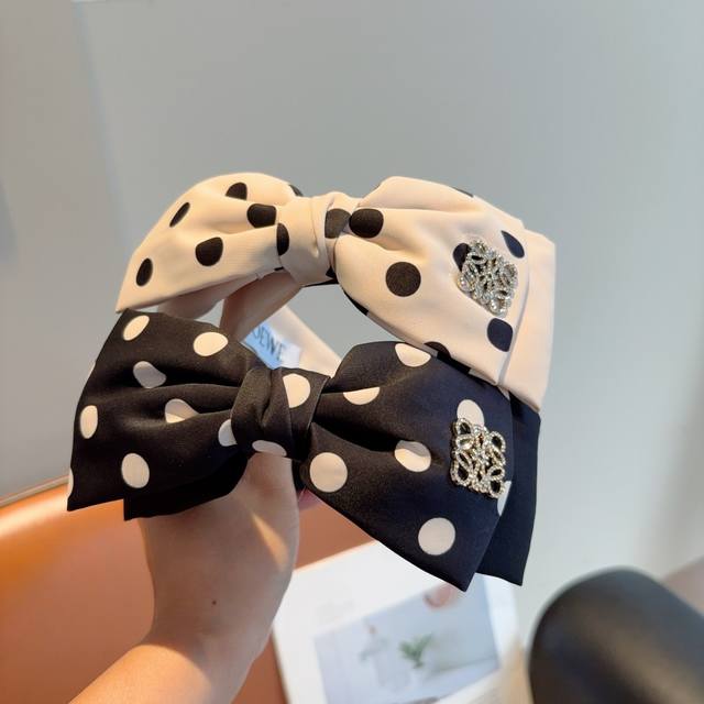with packagingLoewe's new bow polka dot headband, made of specially made fabric