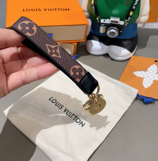 Original Lv Monogram Eclipse Dragonne bag charm and keychain. This Dragonne acc