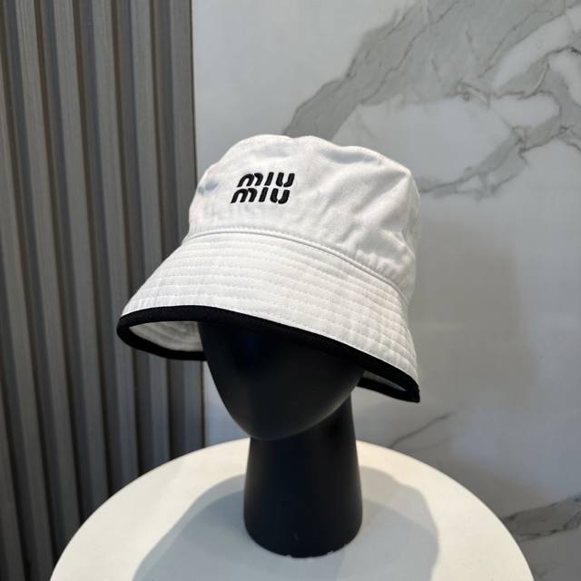 comes with a dust bag. Miumiu's new custom-made embroidered bucket hat is a des