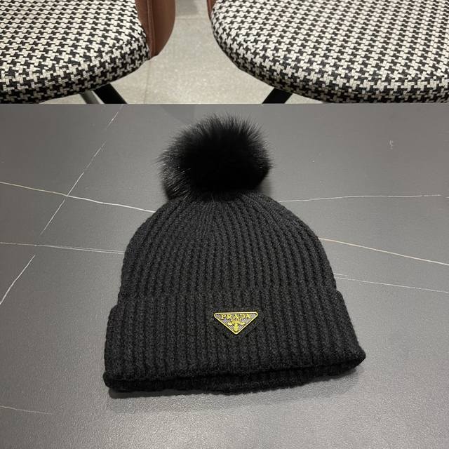 Prada 2025 Autumn/Winter 0 with fox fur ball counter knitted beanie, super popul