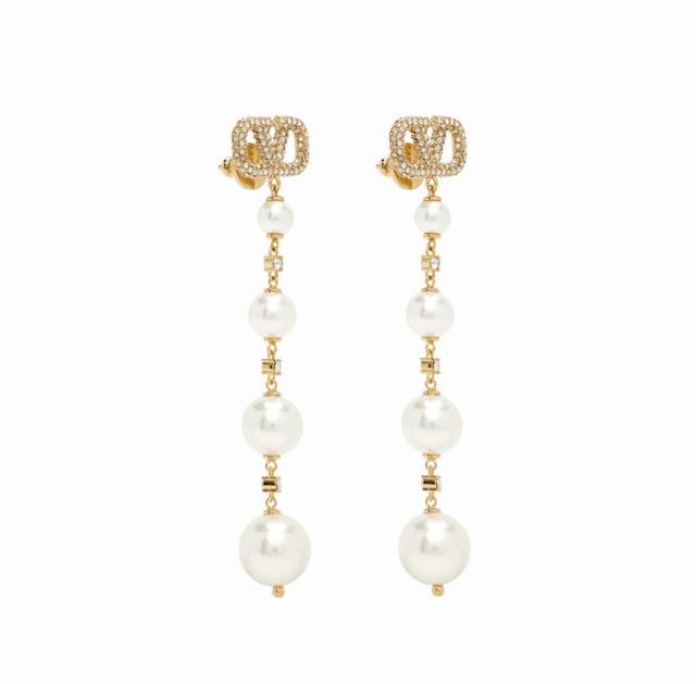 Valentino. Valentino's newest hot diamonds abandon the usual rivets and pearls,