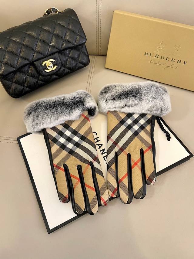 Burberry's new cloth and leather gloves can touch the screen. They are very bea