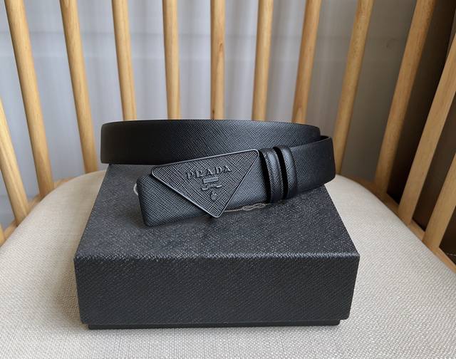 Prada's latest design from the Prada boutique. This buckled belt is part of a ve