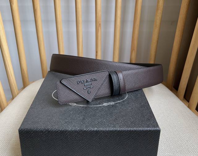 Prada's latest design from the Prada boutique. This buckled belt is part of a ve