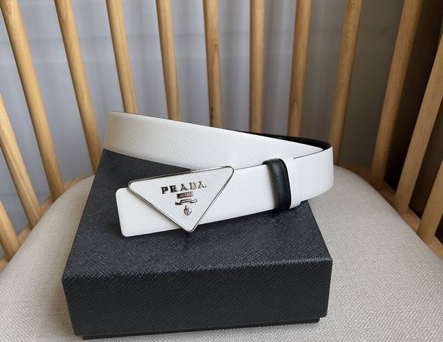 Prada's latest design from the Prada boutique. This buckled belt is part of a ve