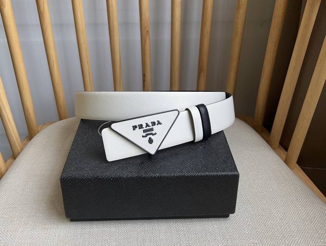 Prada's latest design from the Prada boutique. This buckled belt is part of a ve