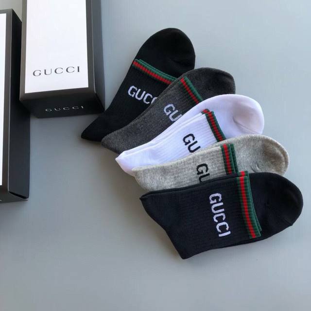 Special Gucci men's socks, five pairs per box, with red and green stripes and th