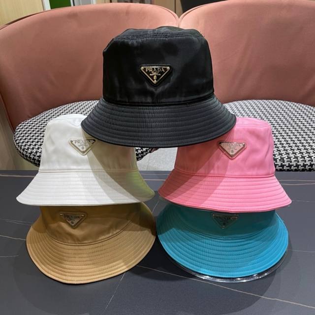 Prada inverted triangle label counter bucket hat has a strong sense of design, w