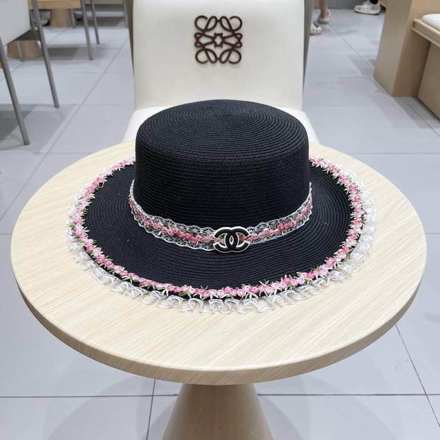 Chanel flat-top straw hat DDD. Made from finely braided Taiwanese straw, this ha