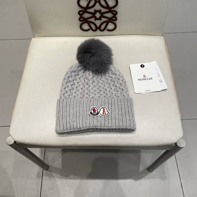 Moncler double logo. Knitted wool hat! A winter favorite for young ladies. Looks