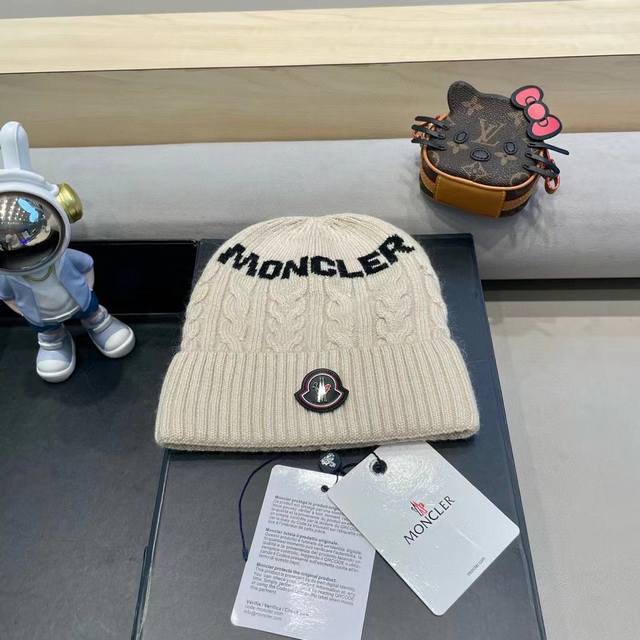 Moncler knitted wool hat with ball! A winter favorite for young ladies~ Looks gr