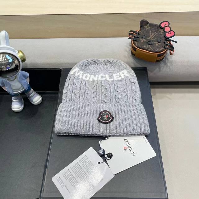 Moncler knitted wool hat with ball! A winter favorite for young ladies~ Looks gr