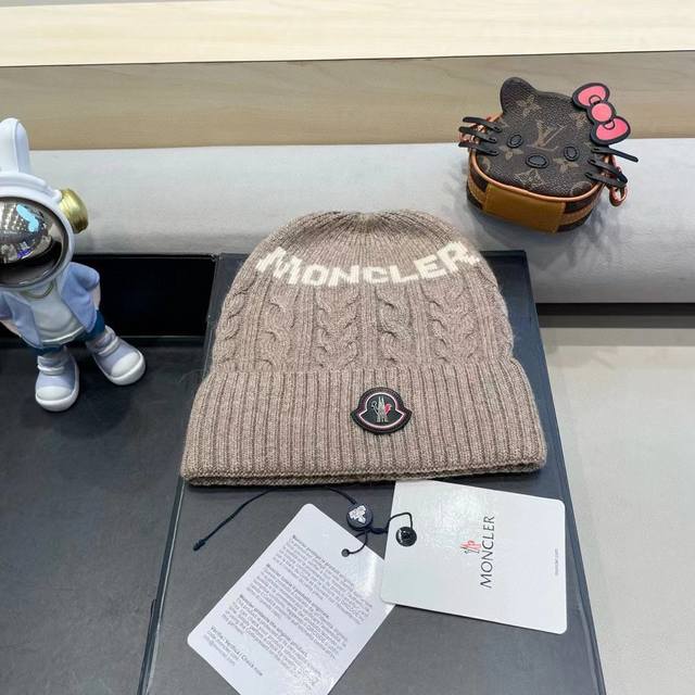 Moncler knitted wool hat with ball! A winter favorite for young ladies~ Looks gr
