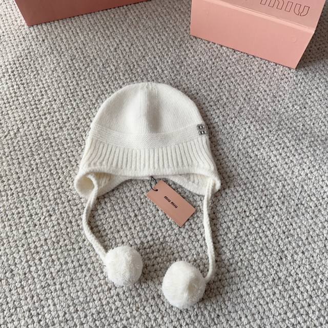 Miumiu new autumn and winter knitted wool hat This is so cute! The earmuffs are