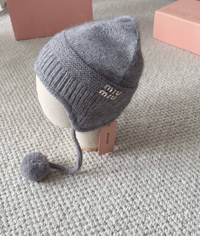 Miumiu new autumn and winter knitted wool hat This is so cute! The earmuffs are
