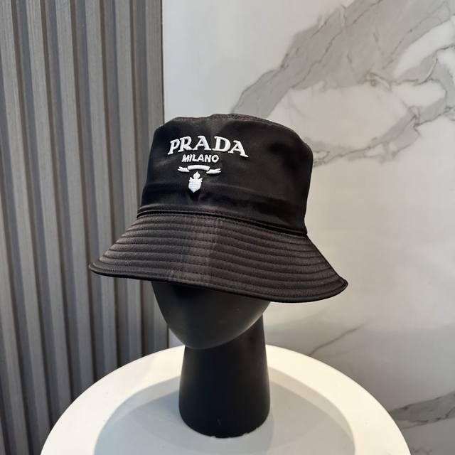 Comes with a dust bag. Prada's new embroidered three-dimensional logo bucket ha