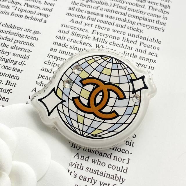 Chanel brooches are hot sellers! The Chan 24 acrylic tennis brooch is a playful