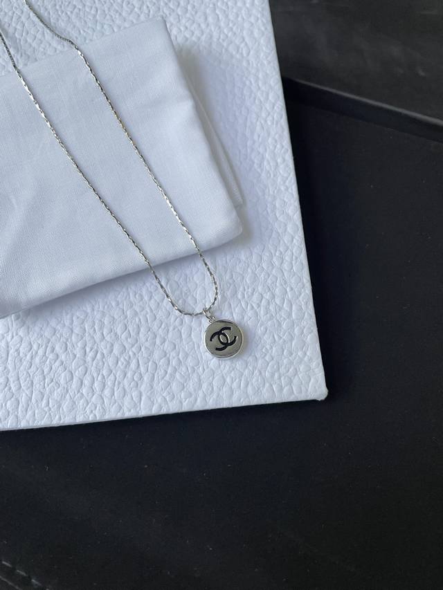 High-quality details. Two in-stock silver bean necklaces are pictured. Don't mis
