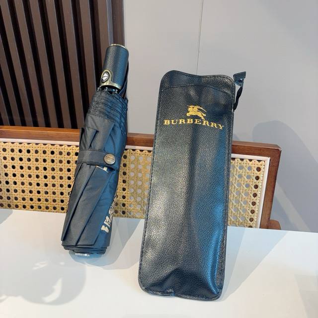 Burberry's tri-fold, self-folding umbrella is the pinnacle of the year. Classic,