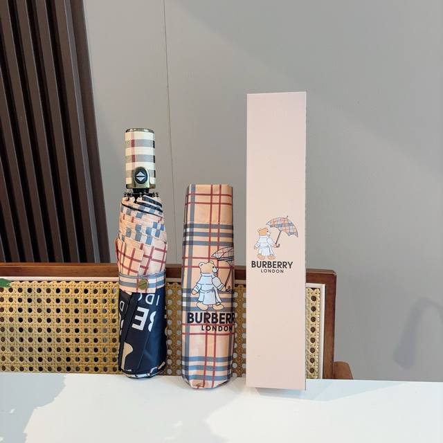 Burberry's tri-fold, self-folding umbrella is the pinnacle of the year. Classic,