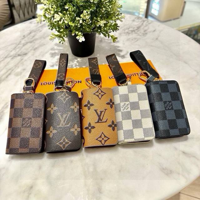 Original picture and packaging. Louis Vuitton classic monogram car keychain and
