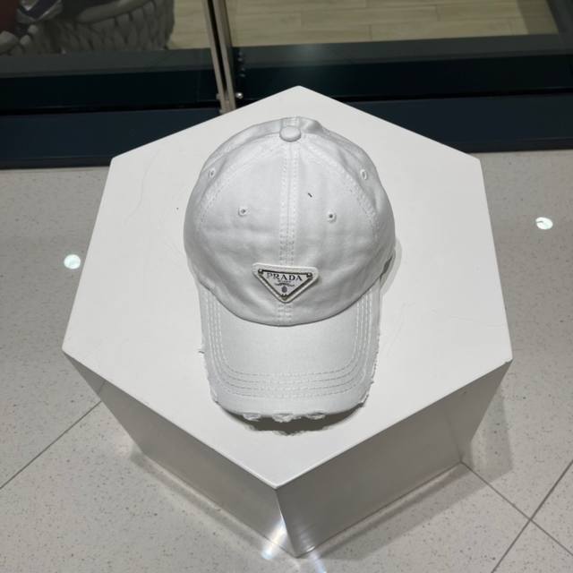Prada classic triangle logo baseball cap is a must-have item that will look grea