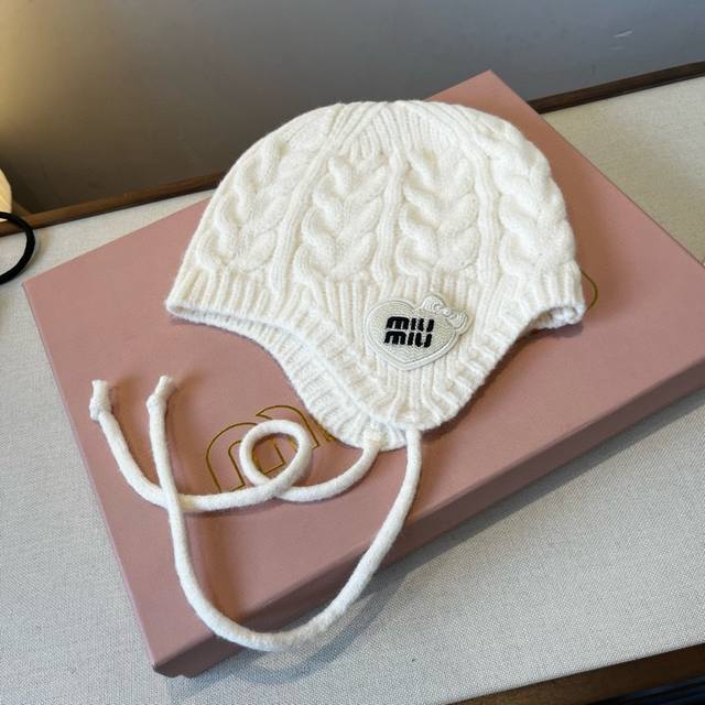 Miu Miu knitted wool hat, earmuffs DDD