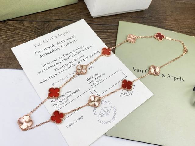 Vca Van Cleef & Arpels' Four-Leaf Clover and Ten-Flower Necklace features a uniq
