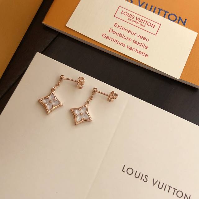 Exquisite Louis Vuitton diamond-shaped earrings with natural white mother-of-pe