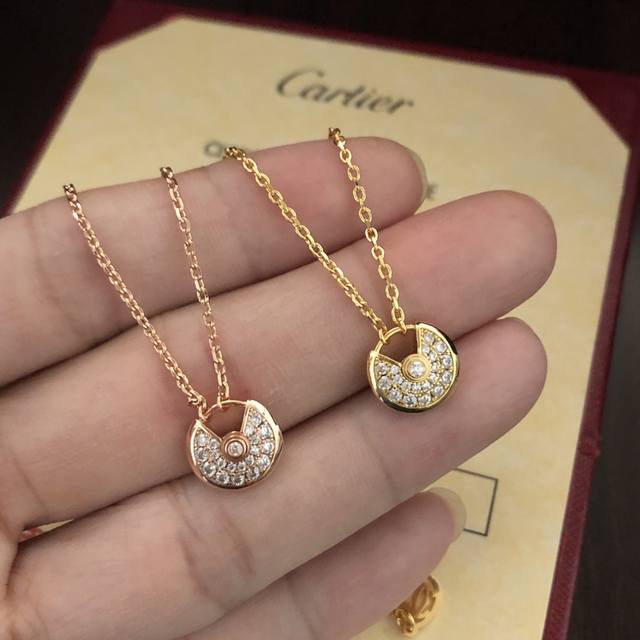 Exclusive, in-stock Cartier amulet necklace. "Amulette" means "amulet" in Frenc